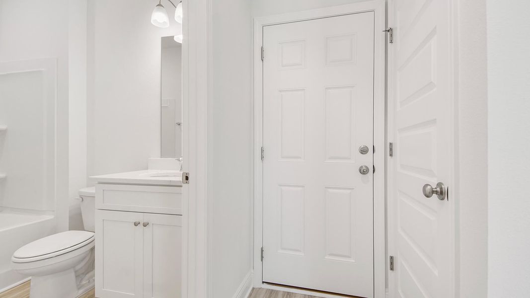 Furnished interior view inside a new home in Bayside at Ward Creek, Panama City Beach (Image 15).