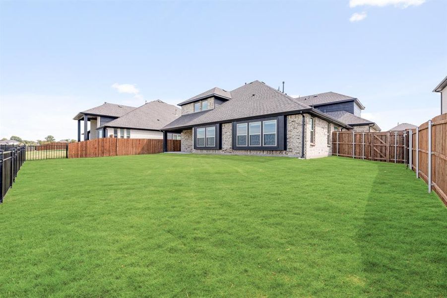 Exterior details and patio area of a home in Devonshire Classic 60-65, Forney (Image 28).