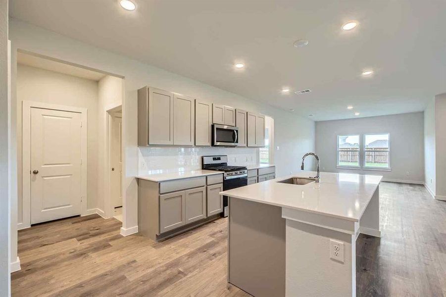 Furnished interior view inside a new home in The Estates Collection at Overland Grove, Forney (Image 5).
