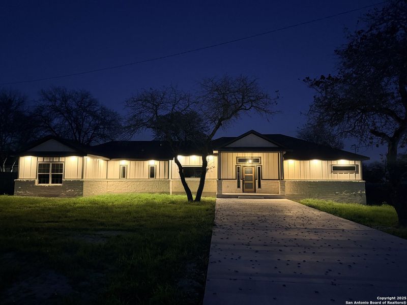 Exterior details and patio area of a home in , Elmendorf (Image 3).