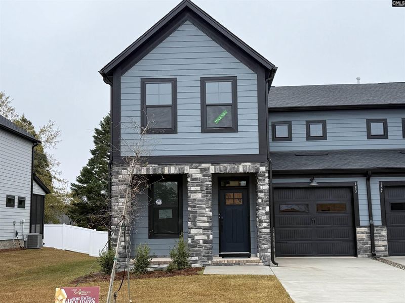 Front exterior of a new home in Dunbar Village, Cayce, SC, highlighting curb appeal (Image 27).