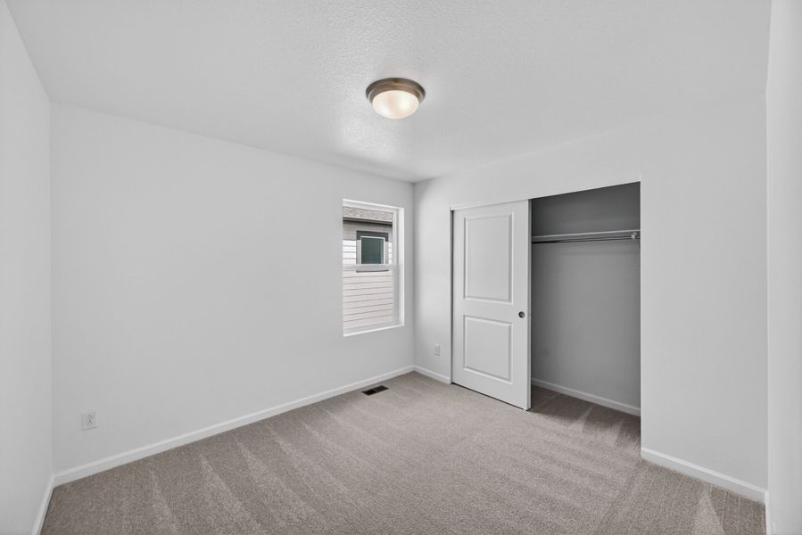 Spacious, unfurnished interior of a new home in Sky Ranch, Watkins (Image 14).