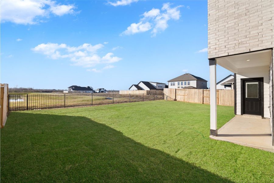 Exterior details and patio area of a home in , Manvel (Image 26).