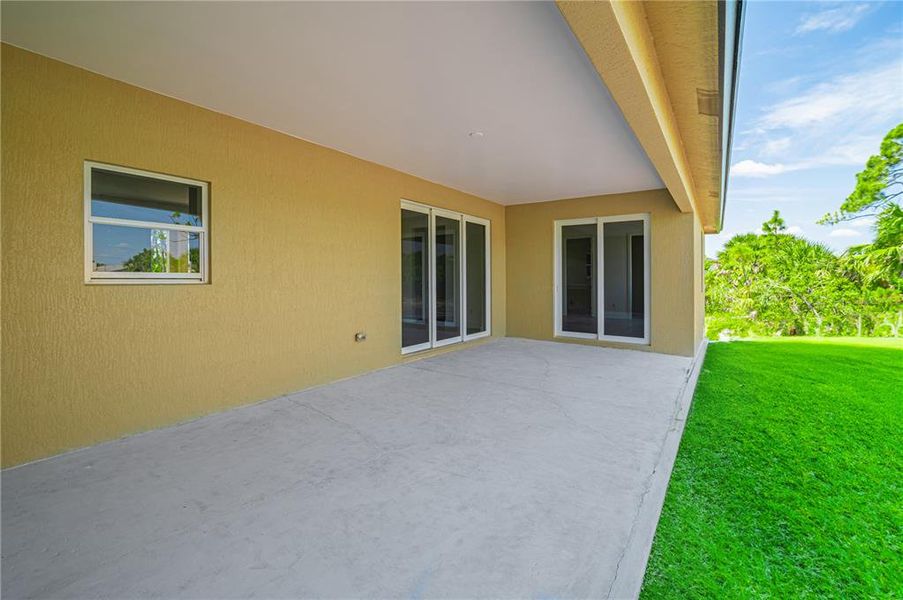 Exterior details and patio area of a home in , Port Charlotte (Image 13).