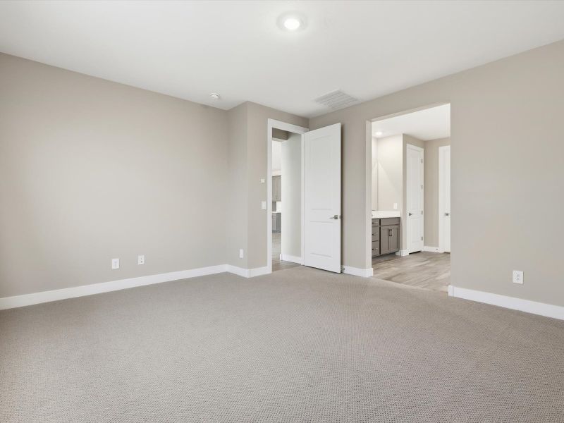 Spacious, unfurnished interior of a new home in Entrada Signature Series, Tolleson (Image 12).