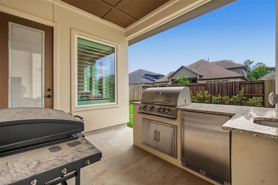 Exterior details and patio area of a home in The Highlands, Porter (Image 22).