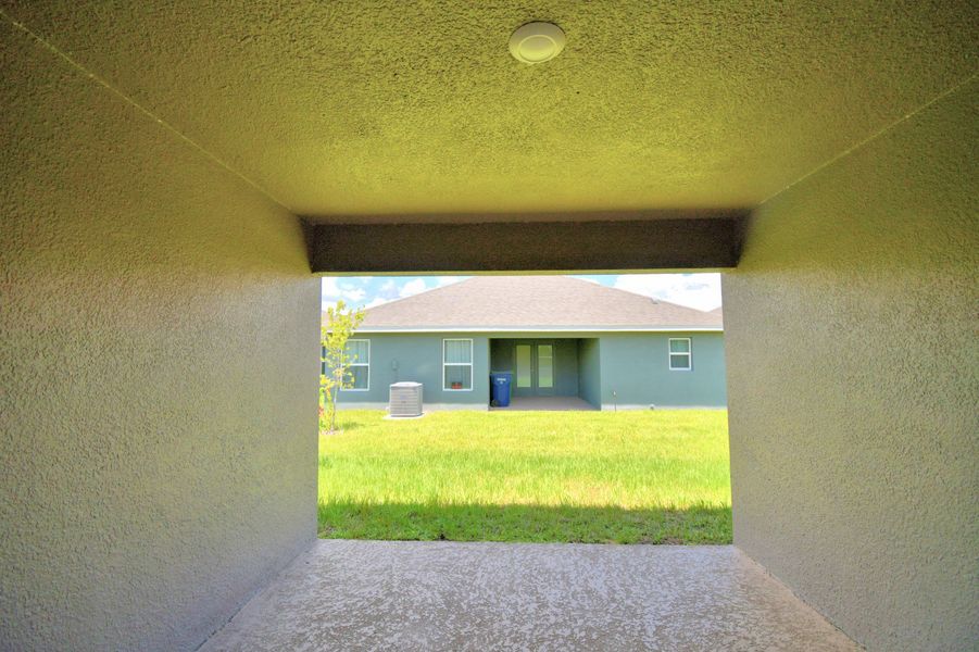 Exterior details and patio area of a home in Villamar, Winter Haven (Image 3).