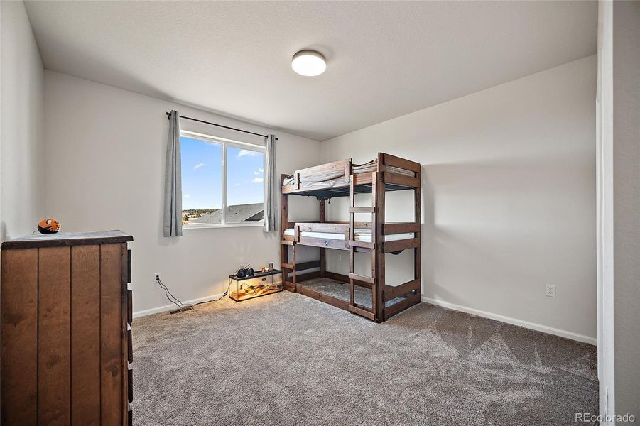 Furnished interior view inside a new home in Paint Brush Hills, Peyton (Image 36).