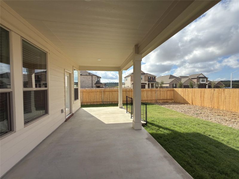 Exterior details and patio area of a home in River Bluff, Leander (Image 2).