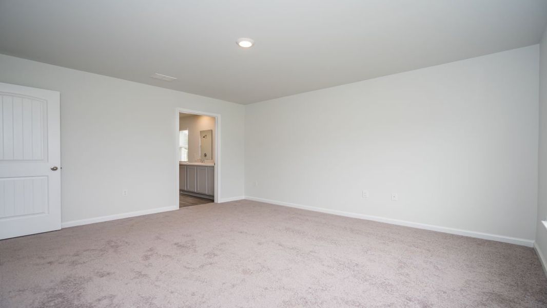 Representative unfurnished interior of a home built from the KERRY by D.R. Horton in Stanbury Creek, Supply (Image 31).