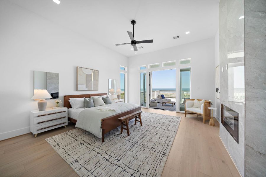 Primary Bedroom with its own access to the decks. Primary Bedroom with its own access to the decks.