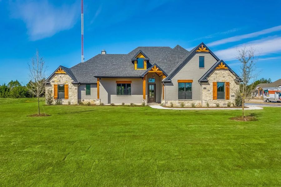 Representative exterior photo of a completed home built from the The Carter by Elmwood Custom Homes in Matthews Farm, Venus, TX (Image 1). Representative exterior photo of a completed home built from the The Carter by Elmwood Custom Homes in Matthews Farm, Venus, TX (Image 1).