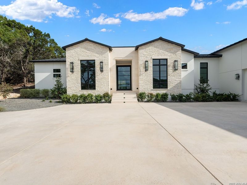 Front exterior of a new home in , San Antonio, TX, highlighting curb appeal (Image 29).