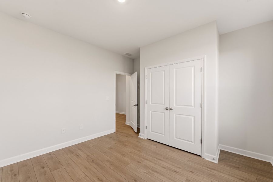 Spacious, unfurnished interior of a new home in Cottages at Lake Emory, Inman (Image 27). Spacious, unfurnished interior of a new home in Cottages at Lake Emory, Inman (Image 27).