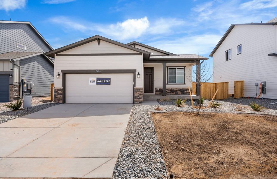 Front exterior of a new home in Wolf Creek Run West, Strasburg, CO, highlighting curb appeal (Image 21).