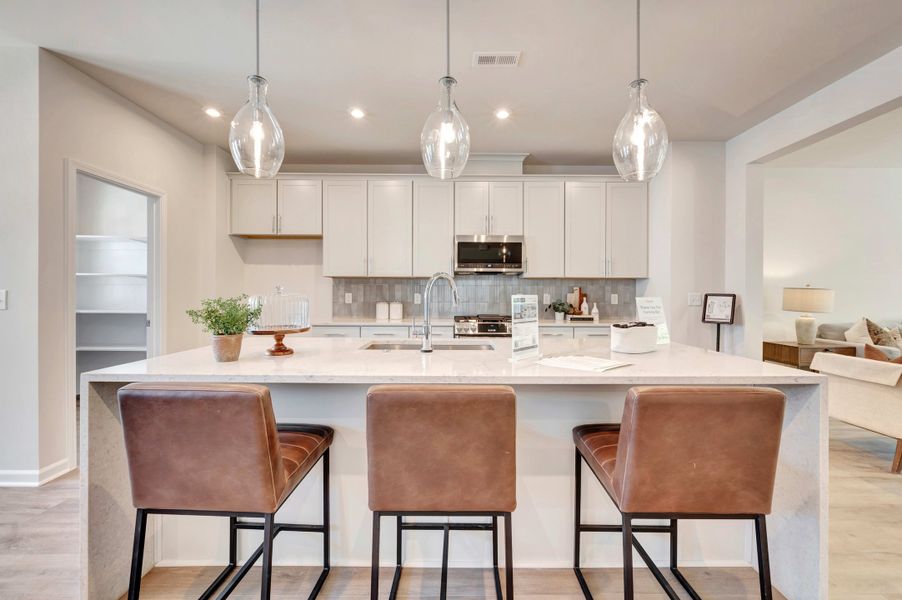 Representative furnished interior of a home built from the Huck by Tri Pointe Homes in Twinleaf Townes, Chapel Hill (Image 9).