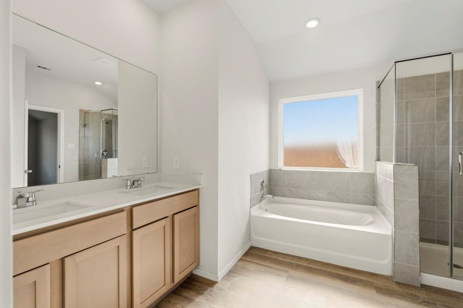 Furnished interior view inside a new home in Sunterra Lakes, Brookshire (Image 6).
