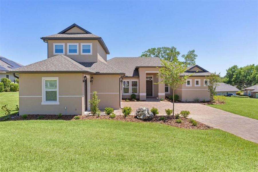 Front exterior of a new home in , Lady Lake, FL, highlighting curb appeal (Image 28).