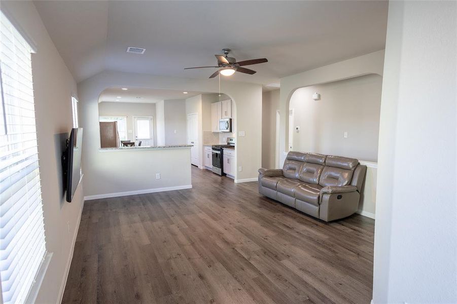 Grand entryway leading into the open-concept living area.