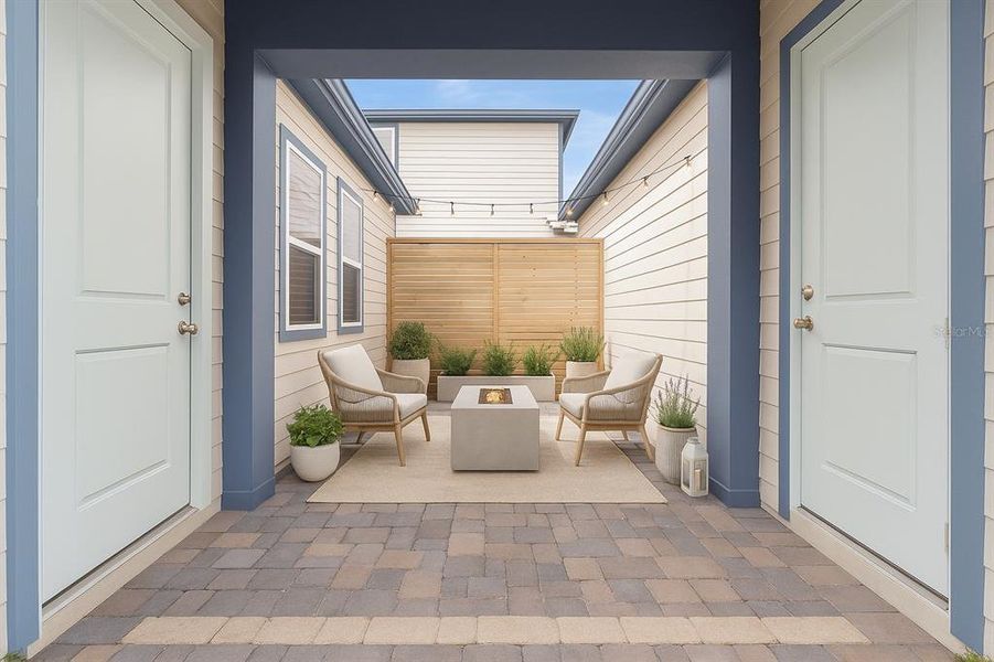 Exterior details and patio area of a home in Weslyn Park at Sunbridge (Craft Homes), St. Cloud (Image 21).
