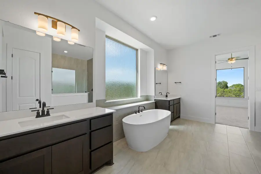 Primary Bath retreat with dual vanities & soaking tub Primary Bath retreat with dual vanities & soaking tub