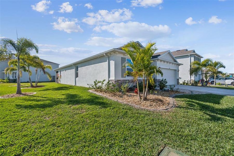 Exterior details and patio area of a home in Bella Lago, Parrish (Image 30).