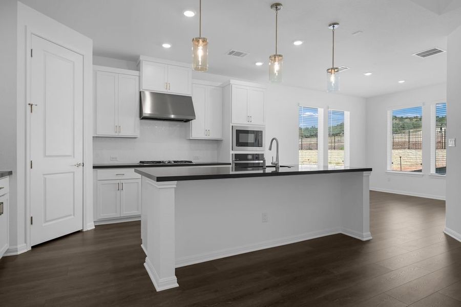 Furnished interior view inside a new home in Travisso Capri Collection, Leander (Image 3).