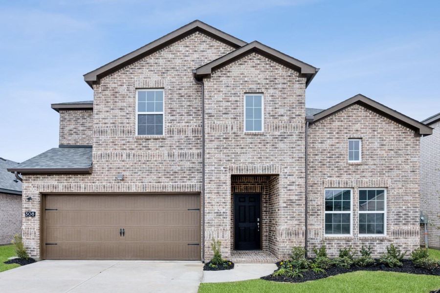 Front exterior of a new home in Saint Tropez, Huffman, TX, highlighting curb appeal (Image 2). Front exterior of a new home in Saint Tropez, Huffman, TX, highlighting curb appeal (Image 2).