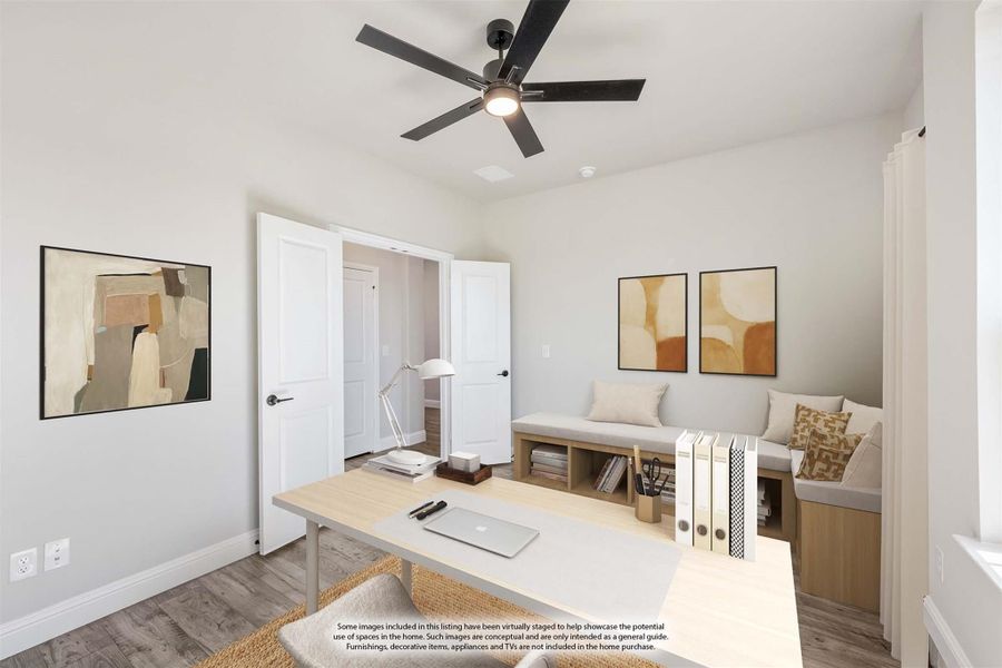 Home office with wood desk, built-in bench seating, ceiling fan, and hardwood floors Home office with wood desk, built-in bench seating, ceiling fan, and hardwood floors