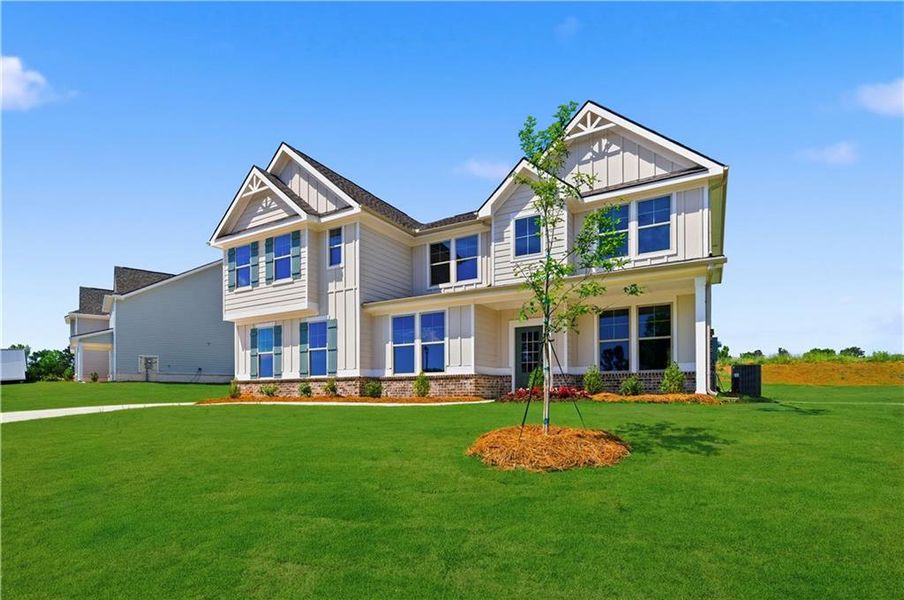 Front exterior of a new home in Brighton, Locust Grove, GA, highlighting curb appeal (Image 16).