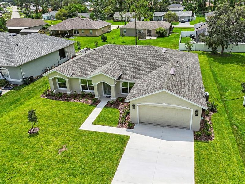 Front exterior of a new home in , Palm Coast, FL, highlighting curb appeal (Image 22).