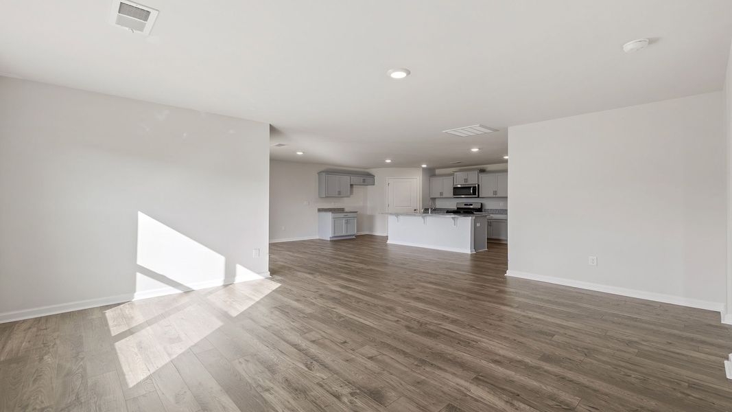Spacious, unfurnished interior of a new home in Bentley Park, Greenwood (Image 25).