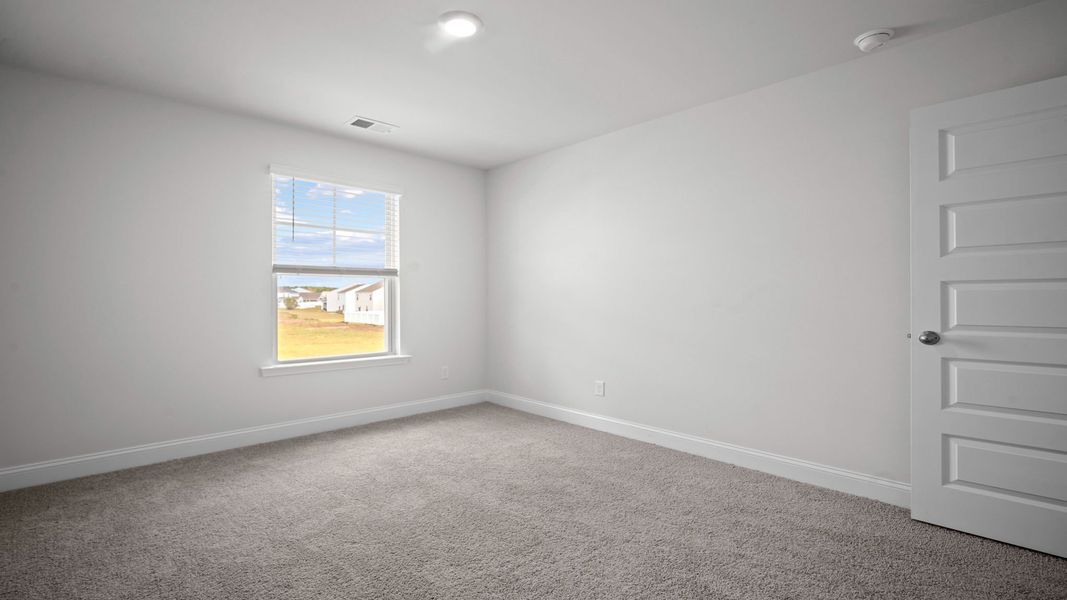 Spacious, unfurnished interior of a new home in Rice Hope, Port Wentworth (Image 24).