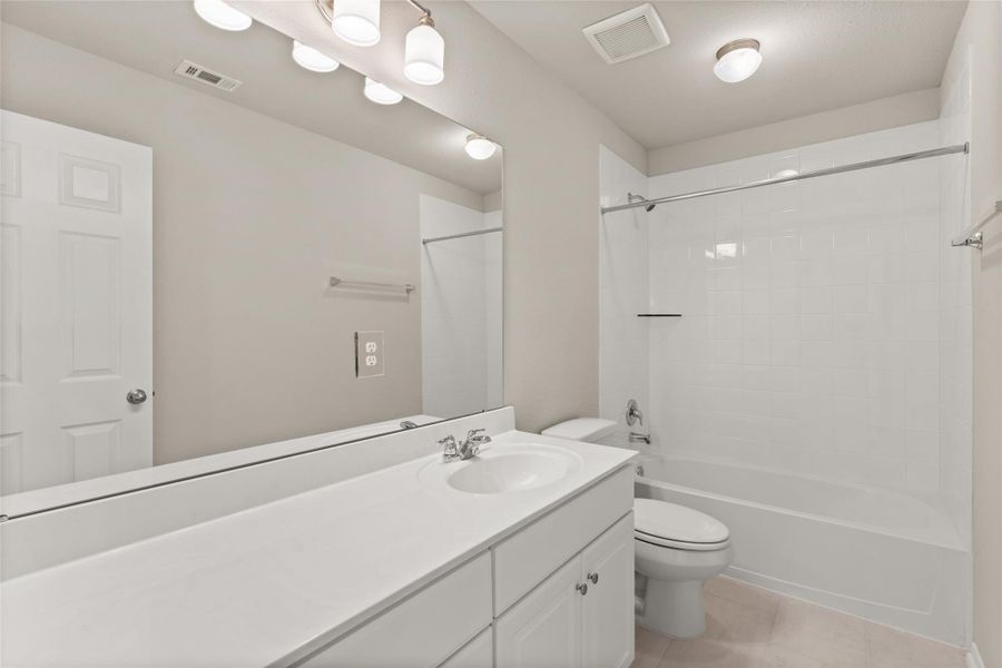 Furnished interior view inside a new home in Spring Creek Trails, Magnolia (Image 8).