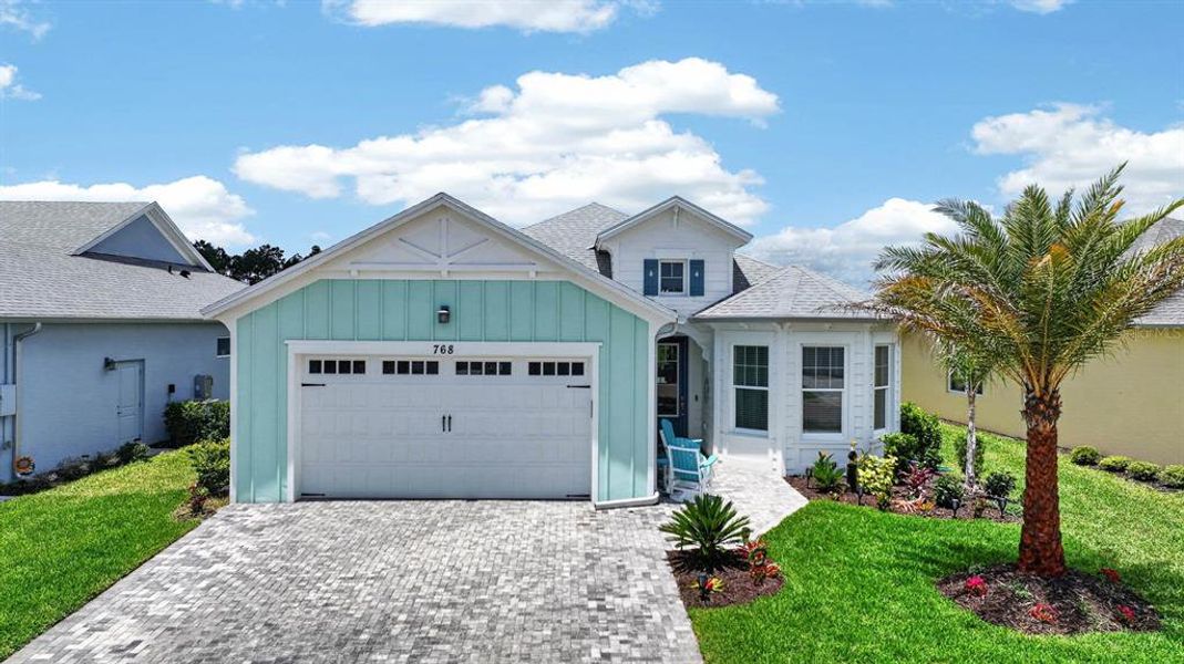 Front exterior of a new home in , Daytona Beach, FL, highlighting curb appeal (Image 32).
