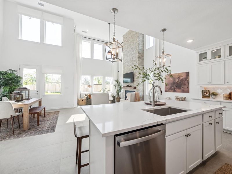 Kitchen open to dining area and great room (*Photo not of actual home and used for illustration purposes only.) Kitchen open to dining area and great room (*Photo not of actual home and used for illustration purposes only.)