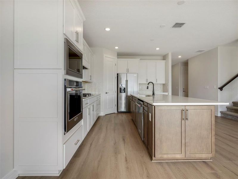 Furnished interior view inside a new home in Willow Ridge, Montverde (Image 12).