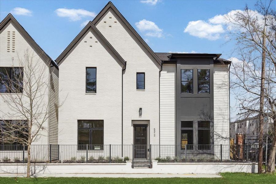 Exceptional Curb Appeal - This home comes with a well-proportioned handsome elevation. Elegant combination of hand slurred brick, painted carriage style garage door with a terracotta paver driveway.