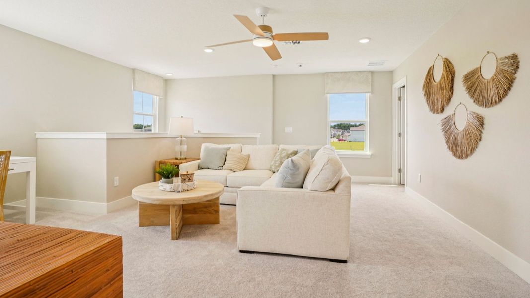 Representative furnished interior of a home built from the Sweetgum by DRB Homes in Ardisia Park, New Smyrna Beach (Image 47).
