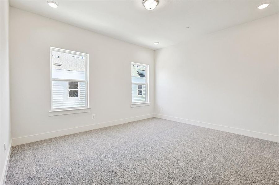 Empty room featuring carpet