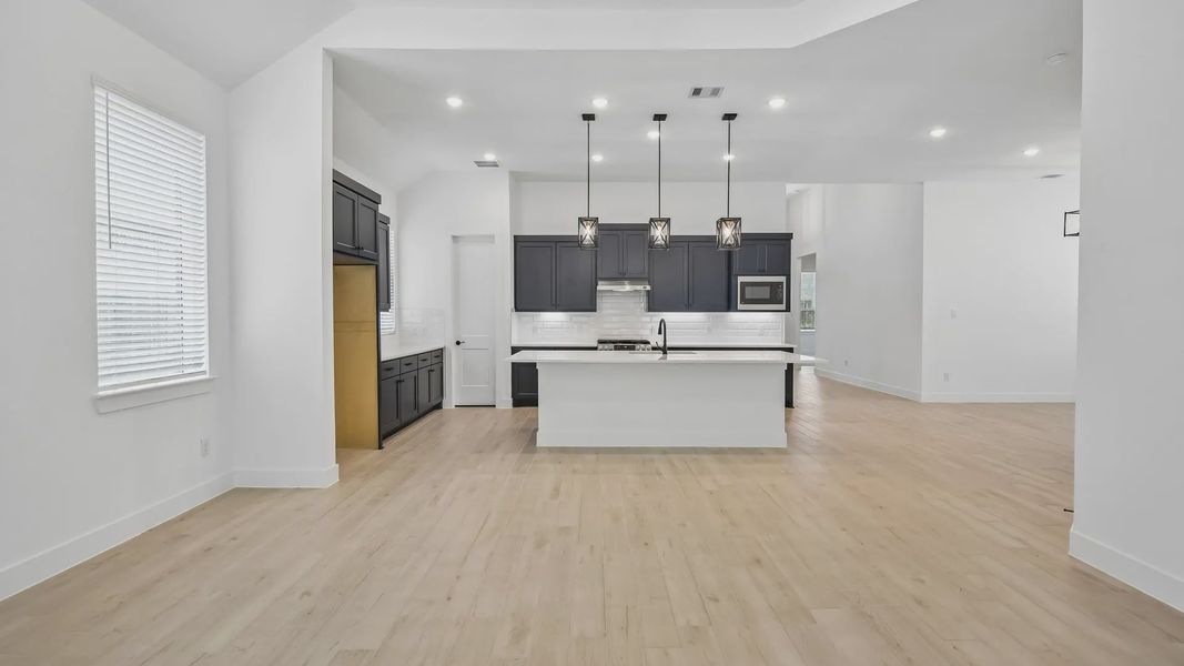 Furnished interior view inside a new home in Artavia, Conroe (Image 5).