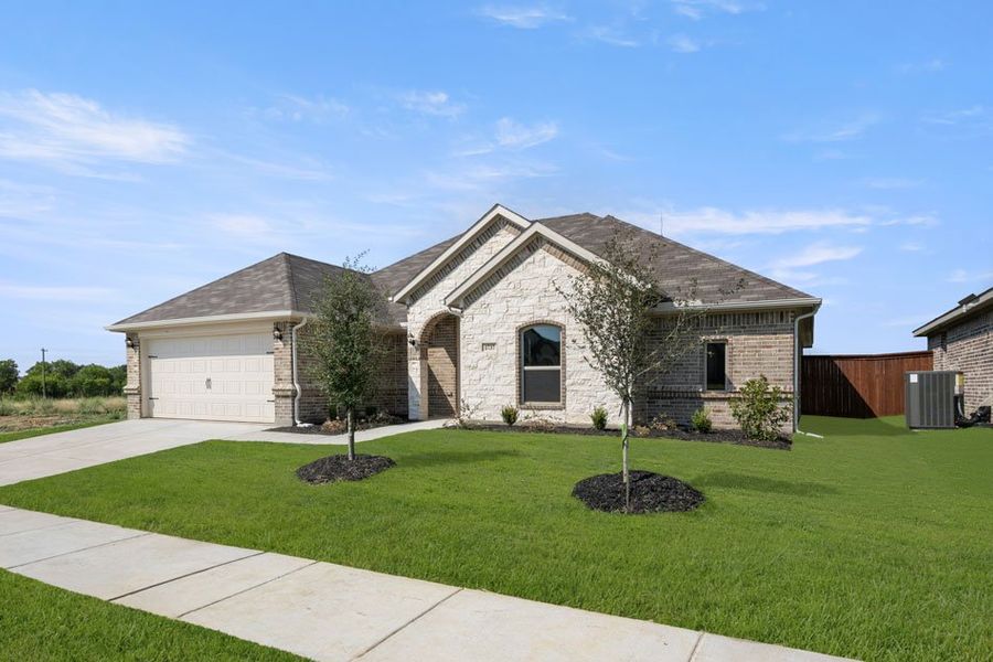 Front exterior of a new home in Still Water Lake, Godley, TX, highlighting curb appeal (Image 4). Front exterior of a new home in Still Water Lake, Godley, TX, highlighting curb appeal (Image 4).