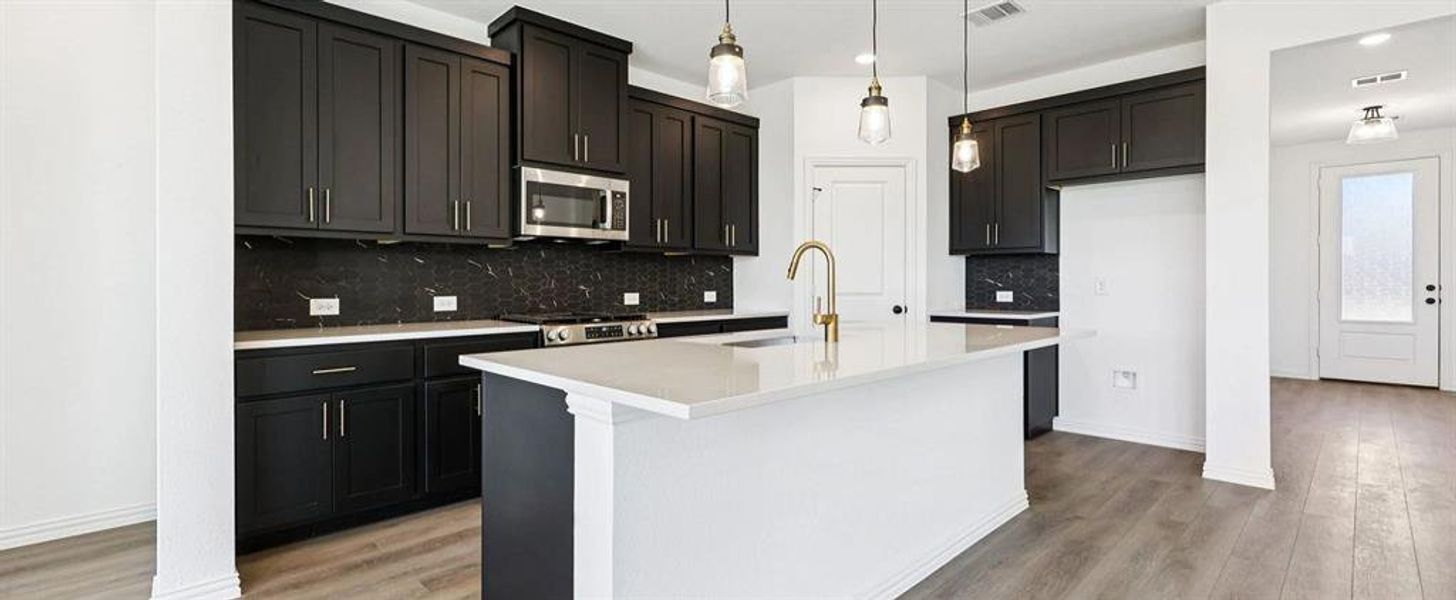 Kitchen featuring the Noir Collection