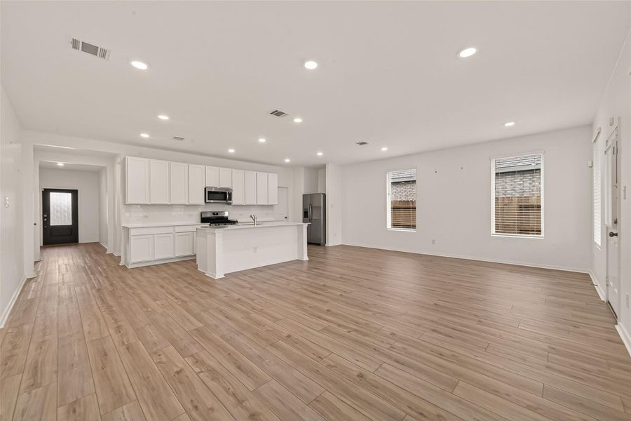 Expansive open living space with plenty of room to host gatherings, create a comfortable media setup, or simply enjoy flexible everyday living.