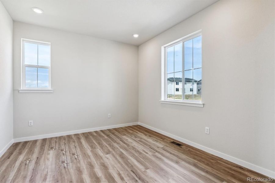 Spacious, unfurnished interior of a new home in Red Barn Meadows, Mead (Image 21).