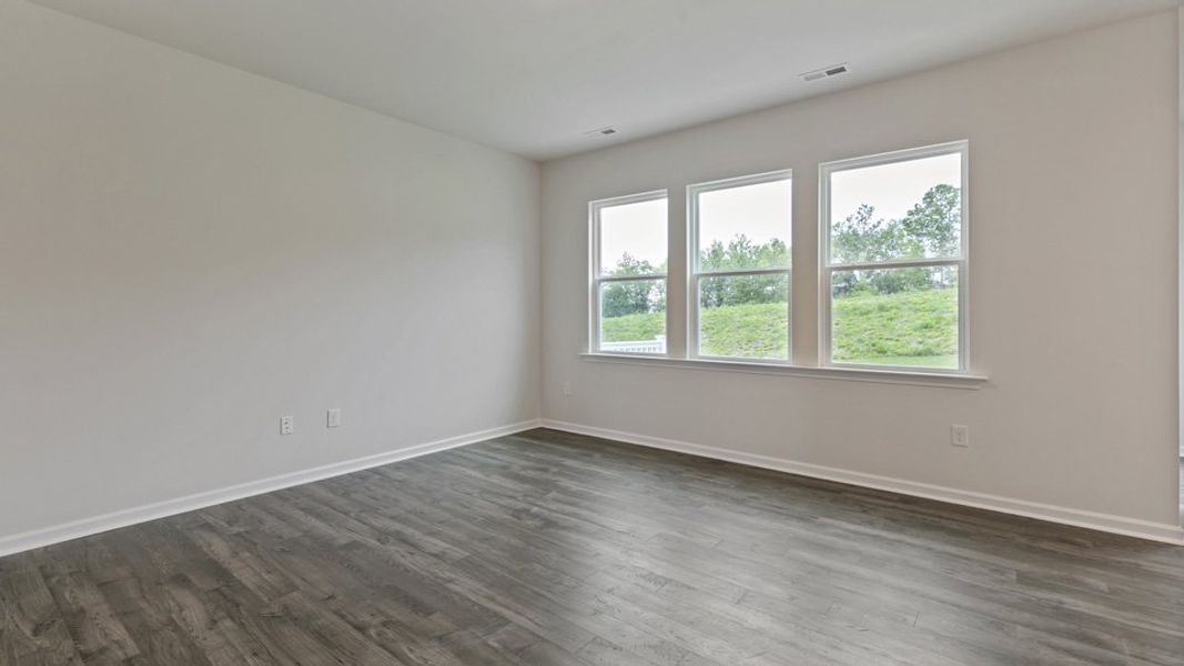 Spacious, unfurnished interior of a new home in The Grove at Matthews Landing, Fuquay Varina (Image 15).