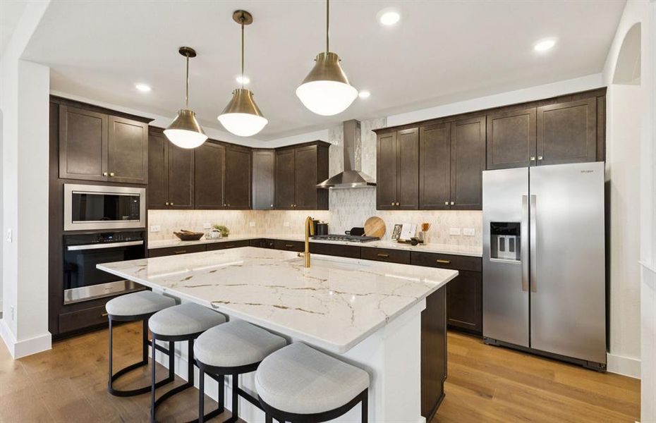 *Model Representation - Spacious kitchen with eat-in bartop island *Model Representation - Spacious kitchen with eat-in bartop island