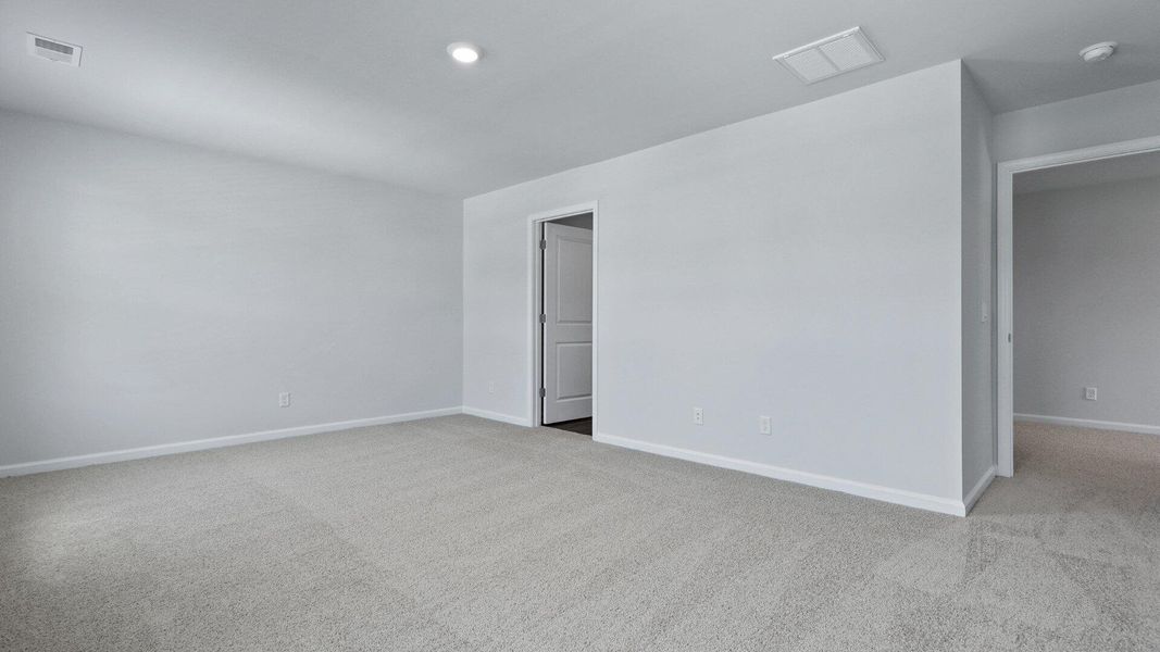 Spacious, unfurnished interior of a new home in Pine Hills at Cane Bay, Summerville (Image 15).