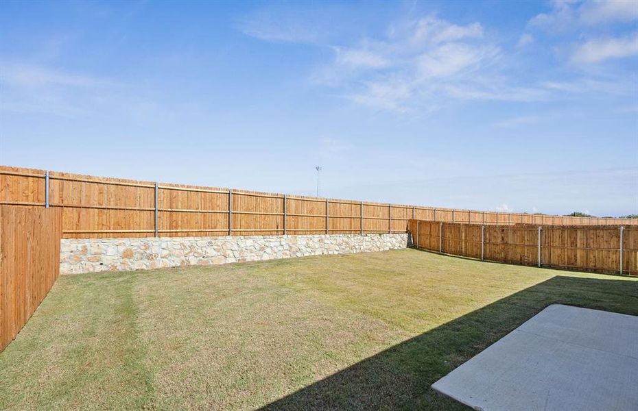 Spacious, fenced-in backyard