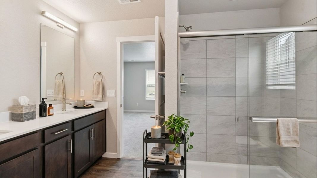 Representative furnished interior of a home built from the Douglas by D.R. Horton in Horizon Uptown, Aurora (Image 10).